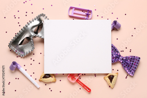 Composition with blank card, carnival mask, Hamantaschen cookies and decor for Purim holiday on color background