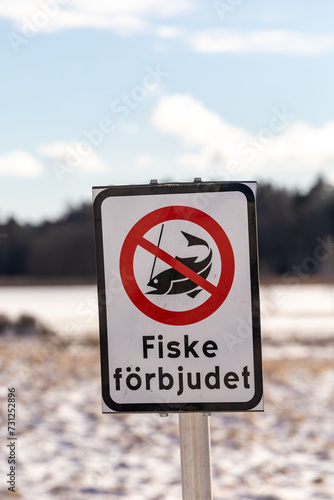 Dalaro, Sweden A sign on a snowy field says in Swedish No Fishing