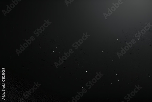 An image of a dark Slate background with black dots