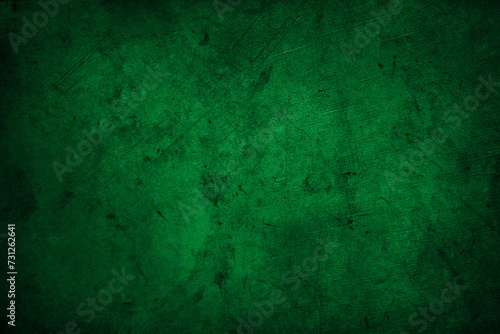 Dark green textured concrete grunge wall background © Stillfx