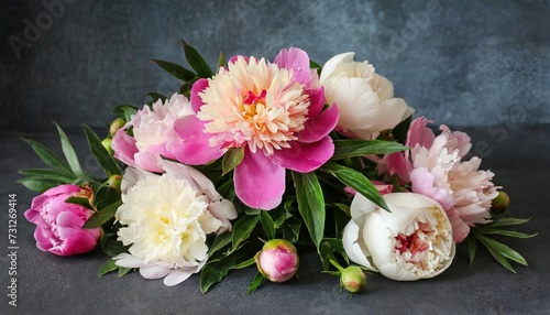 bouquet of peony flowers on dark background