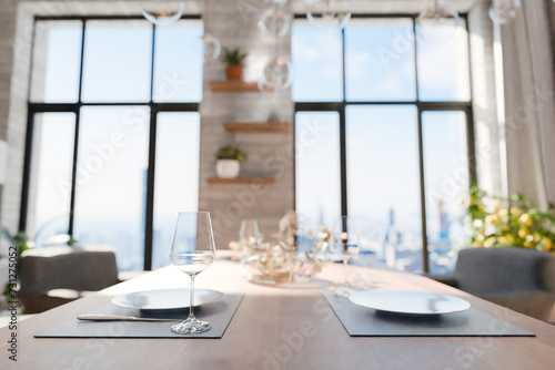 closeup of dining table in luxurious loft apartment with floor-to-ceiling windows and panoramic view; modern minimalistic interior design; bright daylight; 3D rendering