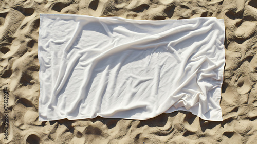 A stunning blank beach towel mockup displayed on the soft sand, showcasing its generous size and premium fabric quality. Perfect for custom designs, this mockup is a must-have for any beach photo