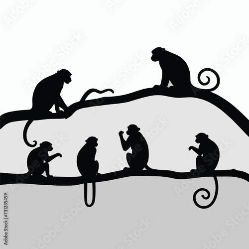 Silhouettes of five monkeys perched on tree branches against a neutral background.