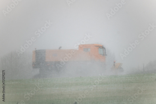 Leeds Bradford Airport LBA in snowy conditions as snow plough and gritters work