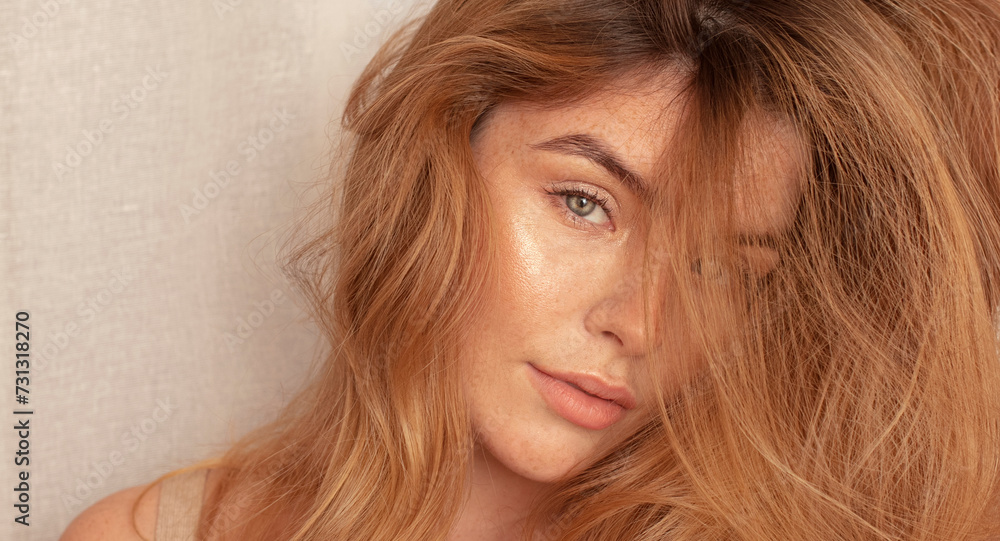 Beauty portrait of attractive redhead woman with freckles. Beauty portrait of attractive redhead woman with freckles.