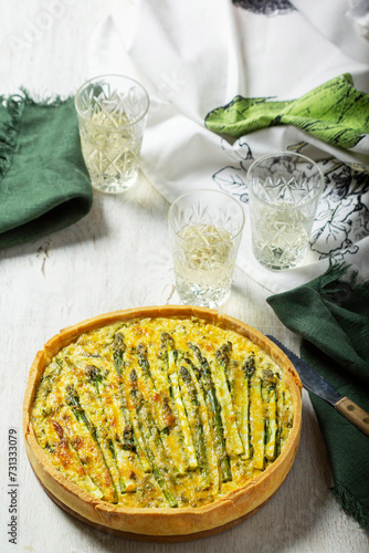 Obraz na płótnie Tart stuffed with asparagus, spinach, chard, cream and cheese, served with white wine. w salonie