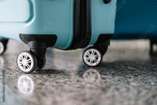 closeup detail blue luggage suitcase wheels