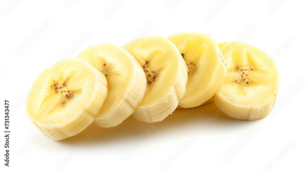 This image captures the freshness and appeal of ripe bananas, with a whole fruit and its slices beautifully isolated against a white backdrop. This image captures the freshness and appeal of ripe bananas, with a whole fruit and its slices beautifully isolated against a white backdrop.