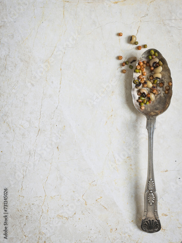 Cow-pea, sorghum and mung bean on spoon. photo