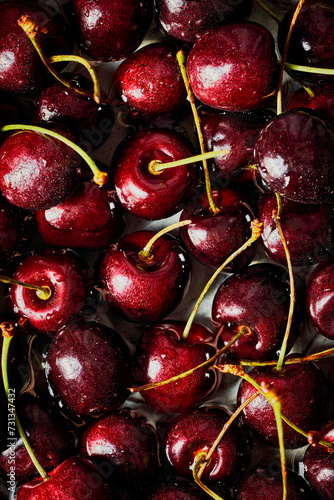 Cherries in a Bowl on a dark grey background