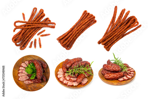 Dry Smoked Sausages Isolated, Salami Sticks, Kielbasa, Cabanossi, Kabanos, Dry Embutido, Chorizo, Bratwurst photo