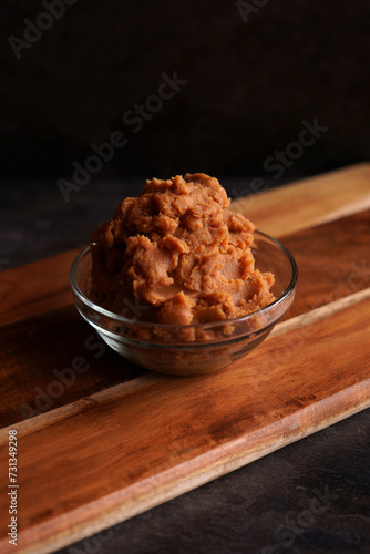 Healthy probiotic Japanese style miso against a dark background. photo
