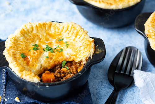 Beef Pot Pies in a black bowl photo