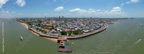 Aerial view of the panoramic cityscape of Santarem, Brazil, along the Tapajos river. Captured by drone, this shot unveils the beauty of the city nestled along the river's edge. photo