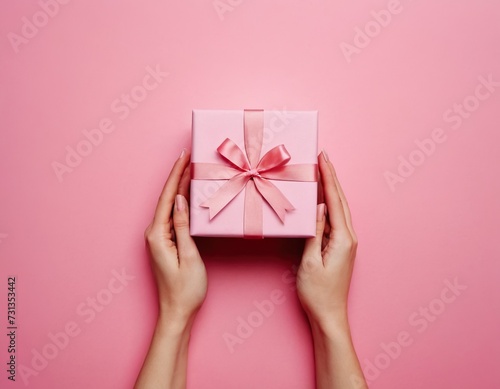 woman holding a gift box