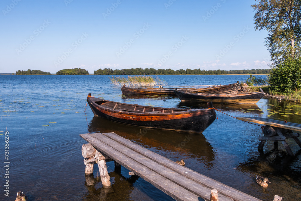 old wooden boats on the shore of Lake Onega. Karelia. beautiful landscape