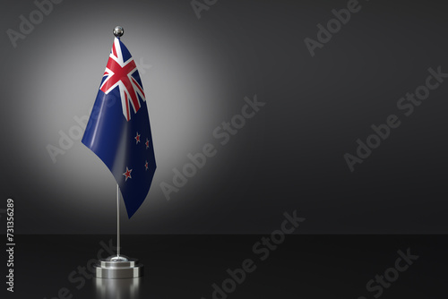 Small National Flag of the New Zealand on a Black Background. 3d Rendering photo