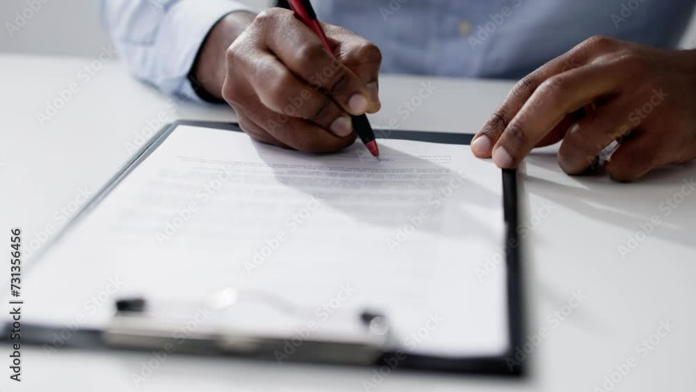 Agreement Form Signature. Hand Signing Paper Agreement Form Signature. Hand Signing Paper