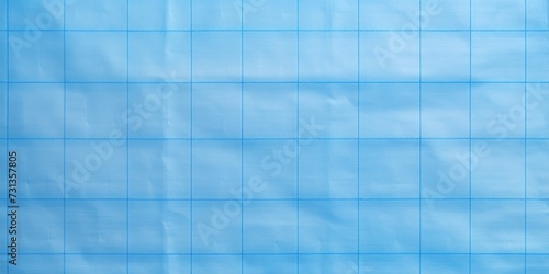 Blue chart paper background in a square grid pattern
