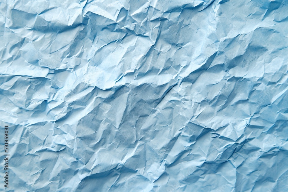 Fototapeta premium Light blue crumpled texture background