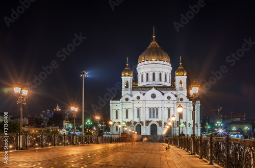 Cathedral of Christ the Savior and Patriarshy bridge at night in Moscow, Russia