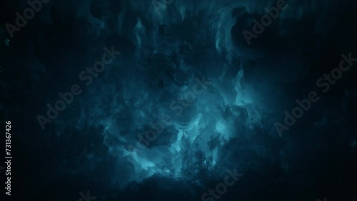 Backlit Inky flowing dark smoke