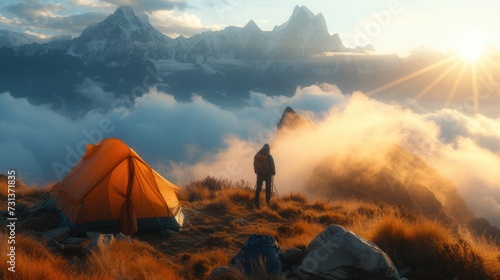 Camping tent of a hiker at beautiful Himalaya area while travel on his trip in the misty morning sunrise.