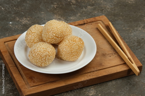 Onde-onde Sesame Seed Ball,Popular Indonesian Snack with Chinese Influence,made from sticky rice flour plus a little rice flour and sugar with green beans paste inside. photo