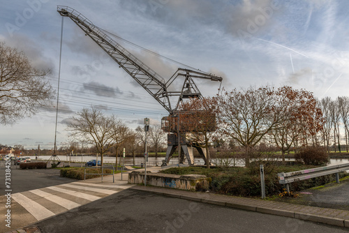 Historic loading crane on the banks of the river main, Frankfurt Hoechst, Germany