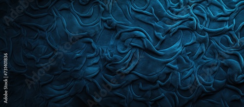 Blue carpet background in a closeup, like wallpaper.