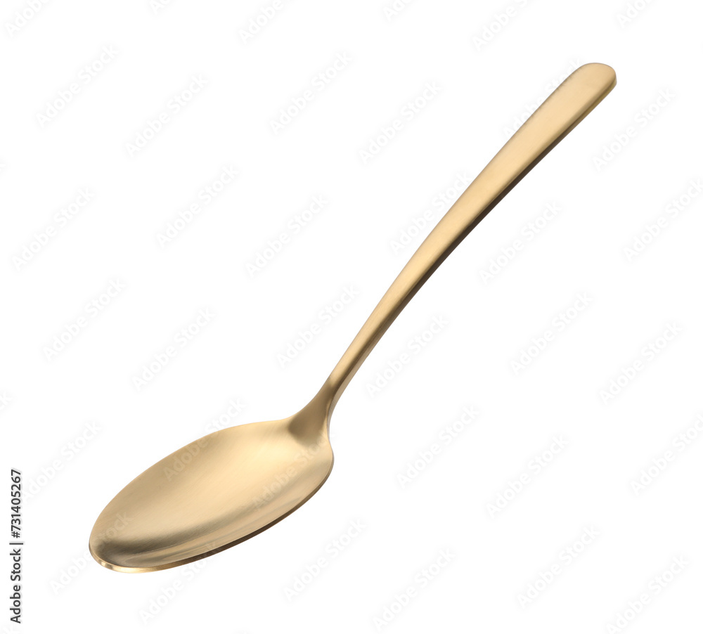 One shiny golden spoon isolated on white One shiny golden spoon isolated on white