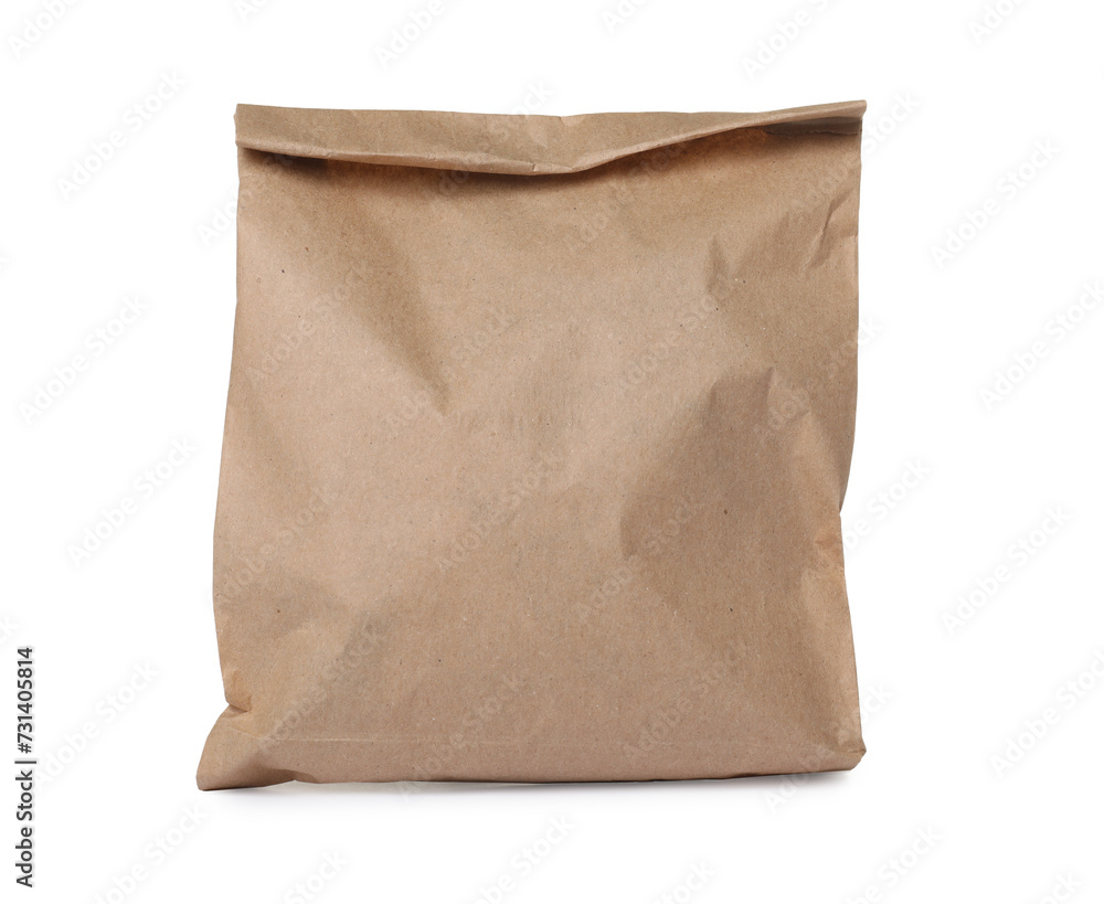 One kraft paper bag isolated on white One kraft paper bag isolated on white