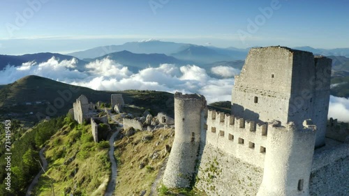 drone flying around rocca calascio at morning abruzzo italy