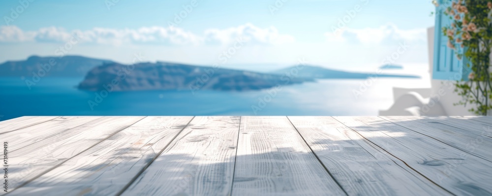 Obraz premium Beautiful scenery: empty white wooden table with Santorini view, blurred bokeh out of open window, product display, defocused bokeh, and blurred background sea with sunlight. product display template
