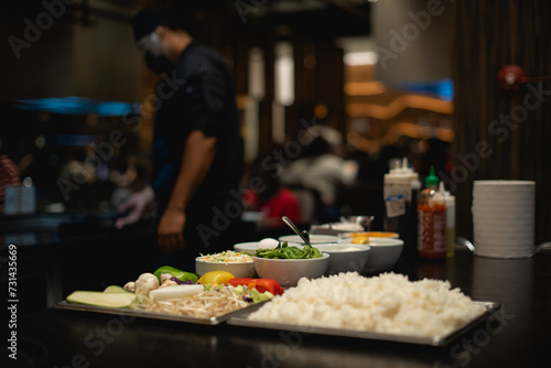 Teppanyaki is a post-World War II style of Japanese cuisine that uses an iron griddle to cook food. 