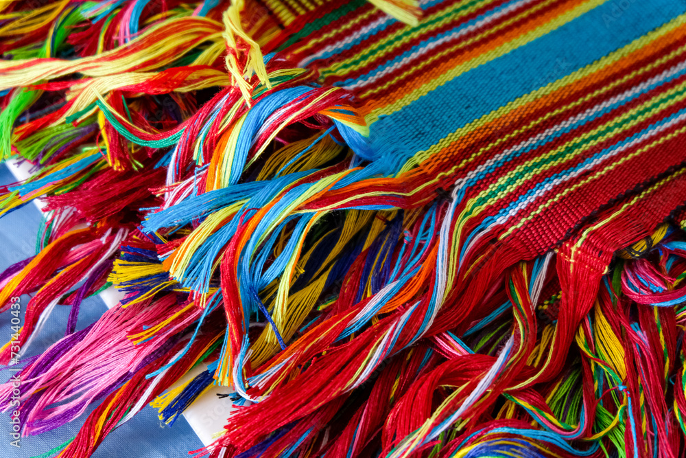 Traditional and cultural woven tais textile scarf with colourful design in Timor-Leste, Southeast Asia