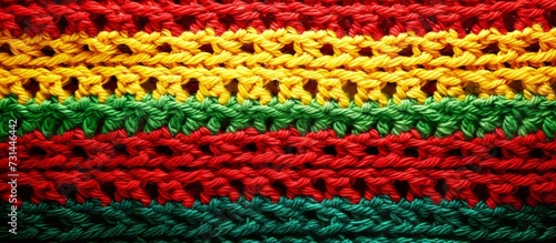 Crochet reggae music flag colors background suitable for various purposes. © 2rogan