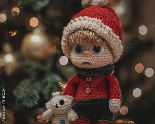 a home alone Christmas crochet doll wearing a red sweater, red scarf, green pants. background has a winter accent and bokeh elements.