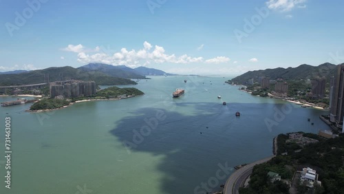 Sham Tseng Ting Kau Tsing Lung Tau Castle Peak Road and Tuen Mun Road Highway Flyover Traffic Roads are built along the slopes of the curved coastline with embankments bridges and culverts  photo