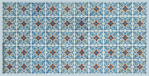 Photography Rows of antique Nyonya Tiles with red flowers with light blue background