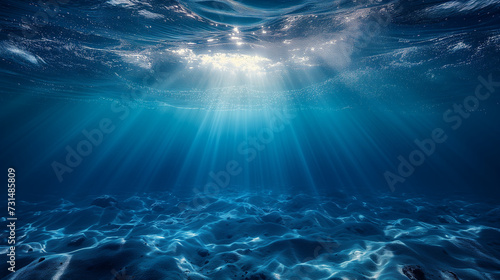 Underwater scene with rays, Underwater shot with sunrays in deep blue tropical sea, Abstract image of Tropical underwater dark blue deep ocean wide nature background, Ai generated image