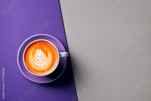 Elegant latte showcasing exquisite foam art on a half purple, half grey background, perfect for minimalist and coffee themes.