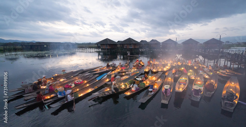 Damnoen Saduak Floating Market or Amphawa. Local people sell fruits, traditional food on boats in canal, Ratchaburi District, Thailand. Famous Asian tourist attraction destination. Festival in Asia. photo