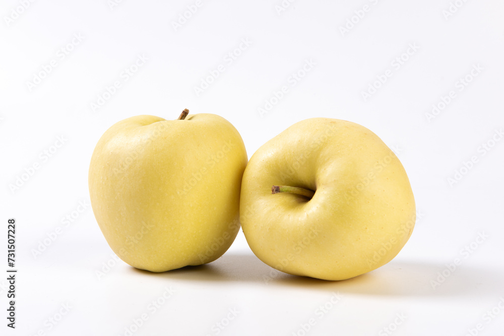 fresh yellow apples isolated on white background. fresh yellow apples isolated on white background.
