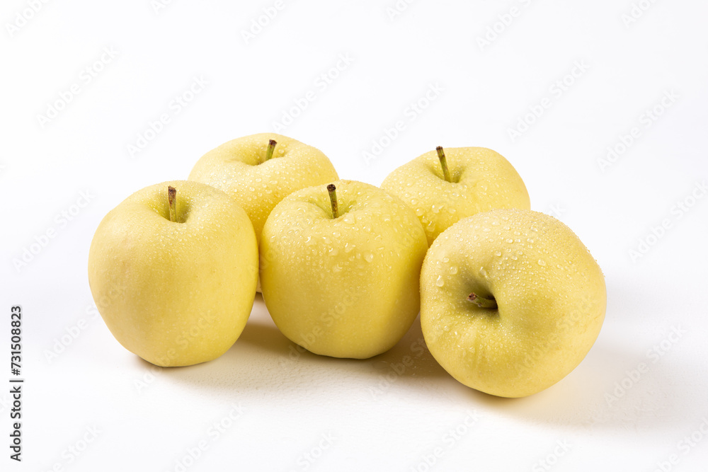 fresh yellow apples isolated on white background. fresh yellow apples isolated on white background.