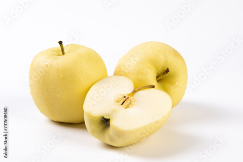 fresh yellow apples isolated on white background.