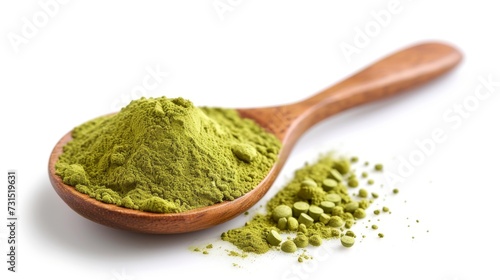 Green tea powder on wooden spoon isolated on white background
