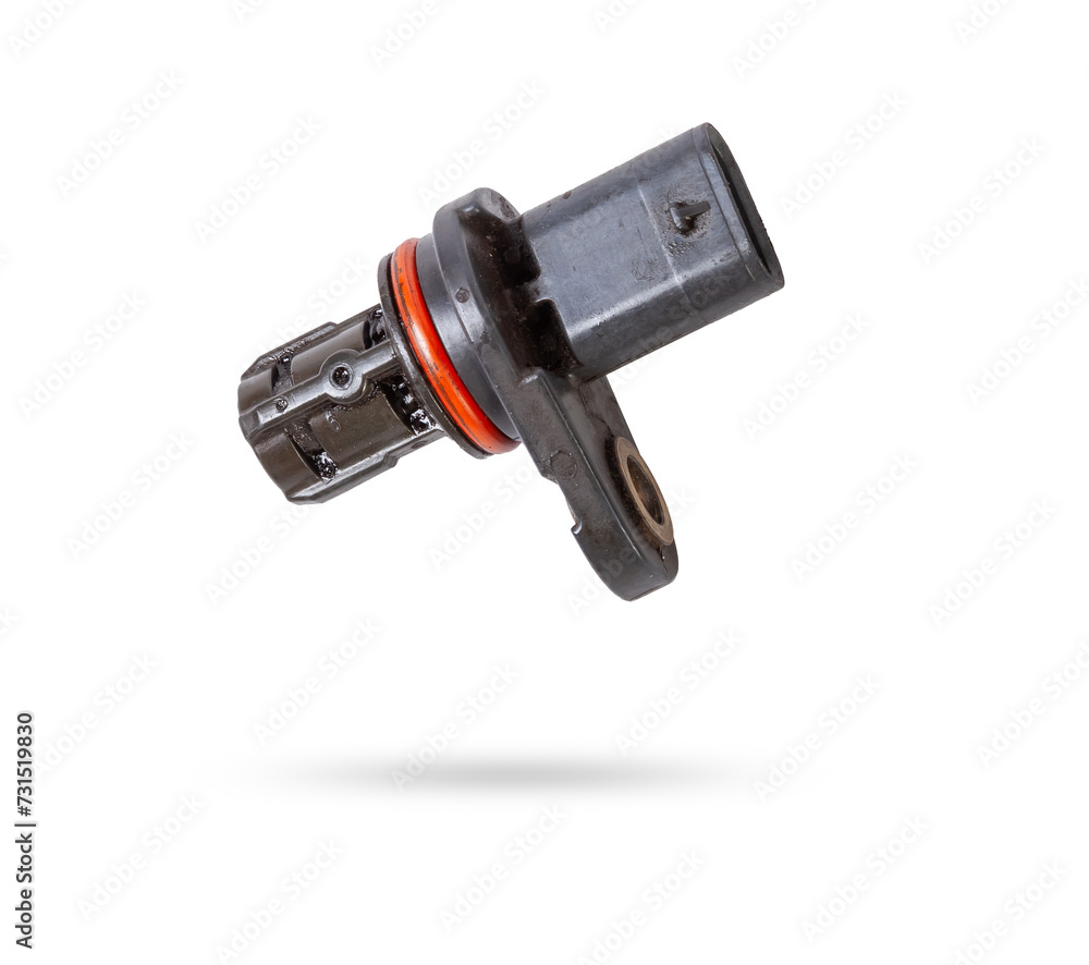 Electromagnetic crankshaft position sensor of a car engine in the hands of an auto mechanic. Spare parts catalog. Electromagnetic crankshaft position sensor of a car engine in the hands of an auto mechanic. Spare parts catalog.