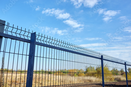Metal wire fence to protect the territory. Painted wire mesh grille fence panels